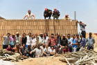 Group picture of all of the aid workers and the refugees during Al-Ghanem's stay. Photos courtesy of Lemma Al-Ghanem and EAHR