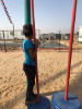Syrian refugee Nasser, whom Al-Ghanem befriended during the project, watches construction progress. Photo: Lemma Al-Ghanem