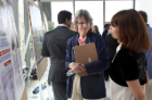 Susan Graham, MD (left), ponders a point with Cherie Lisa Vaz, MBBS.