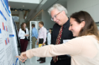 Samantha Stein explains her study on opiate-induced plasticity to Terry Connell, PhD.