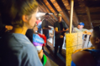 students tour house attic. 