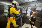 Using volunteers from several Buffalo-area fire companies, CRESE scientists are testing the effects of different cooling interventions after running study participants through a battery of tests in the lab. Photo: Douglas Levere.