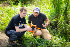 Research support specialist Ivan Parmuzin and graduate instructional support technician Travis Nelson, both in the UB Department of Geology, helped to record data during the sediment coring activity at Bizer Creek. Credit: Douglas Levere / University at Buffalo