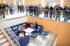 Attendees check out one of the casual lounge areas between the first and second floors. Photo: Meredith Forrest Kulwicki