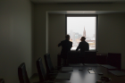 Awe-inspiring inside and out: In silhouette, attendees admire the dramatic views of downtown Buffalo. Photo: Douglas Levere