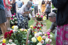 Family members were invited to take a rose from the floral arrangement.