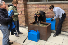Staff from the Wildlife Department of SPCA Serving Erie County use boxes to relocate Ruth and her goslings to Lake LaSalle.