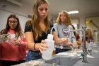 Isabella Rizzo carefully rinses her crystal.