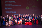 Performers gather for a group photo after the show.