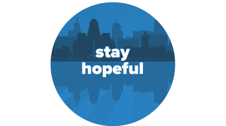 Text says: Stay hopeful Background image is buffalo skyline. 