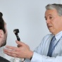 Dr. John Sellick examining a male patient. Dr. Sellick is a member of UBMD Internal Medicine, part of UBMD Physicians' Group, the largest medical group in Western New York. 