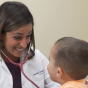 Dr. Jessica Donhauser with a patient. Dr. Donhauser is a physician with UBMD Pediatrics. UBMD Pediatrics is a member of UBMD Physicians' Group, the largest medical group in Western New York. 